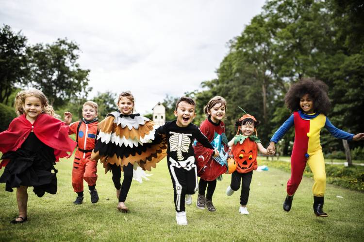 children dressed up for halloween - book at the zoo